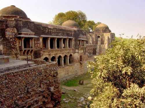 best places to visit in delhi-Hauz Khas is a historic complex in Delhi, blending medieval architecture with modern vibrancy. It features ancient tombs, a large reservoir, and lush gardens, alongside trendy cafes, art galleries, and boutiques.