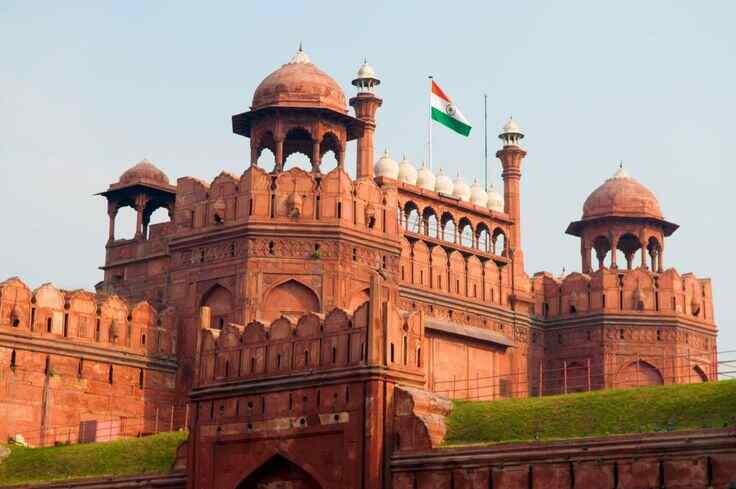 best place to visit in delhi-Historic Red Fort in Delhi, a UNESCO World Heritage Site and iconic tourist attraction symbolizing India's rich Mughal heritage.