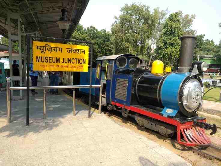 best places to visit in delhi-The National Rail Museum in Delhi showcases a vast collection of historic locomotives, carriages, and rail artifacts, offering interactive exhibits and outdoor displays that celebrate India's rich railway heritage.