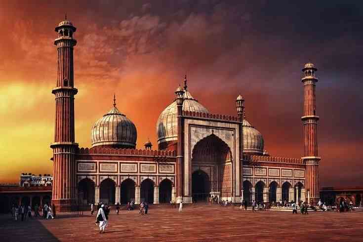 best place to travel in delhi-Jama Masjid is a grand mosque in Old Delhi, featuring impressive red sandstone and marble architecture, towering minarets, and vast courtyards, offering a serene place of worship amidst the city's hustle.